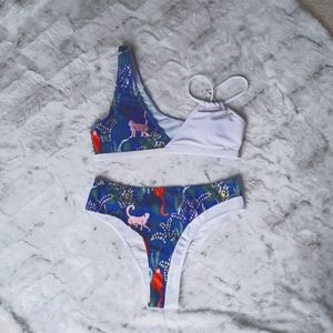 New 2 piece swimsuit monkey pattern. Size M.